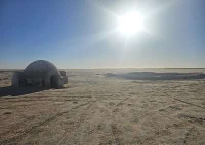 Igloo house with sun shining brightly